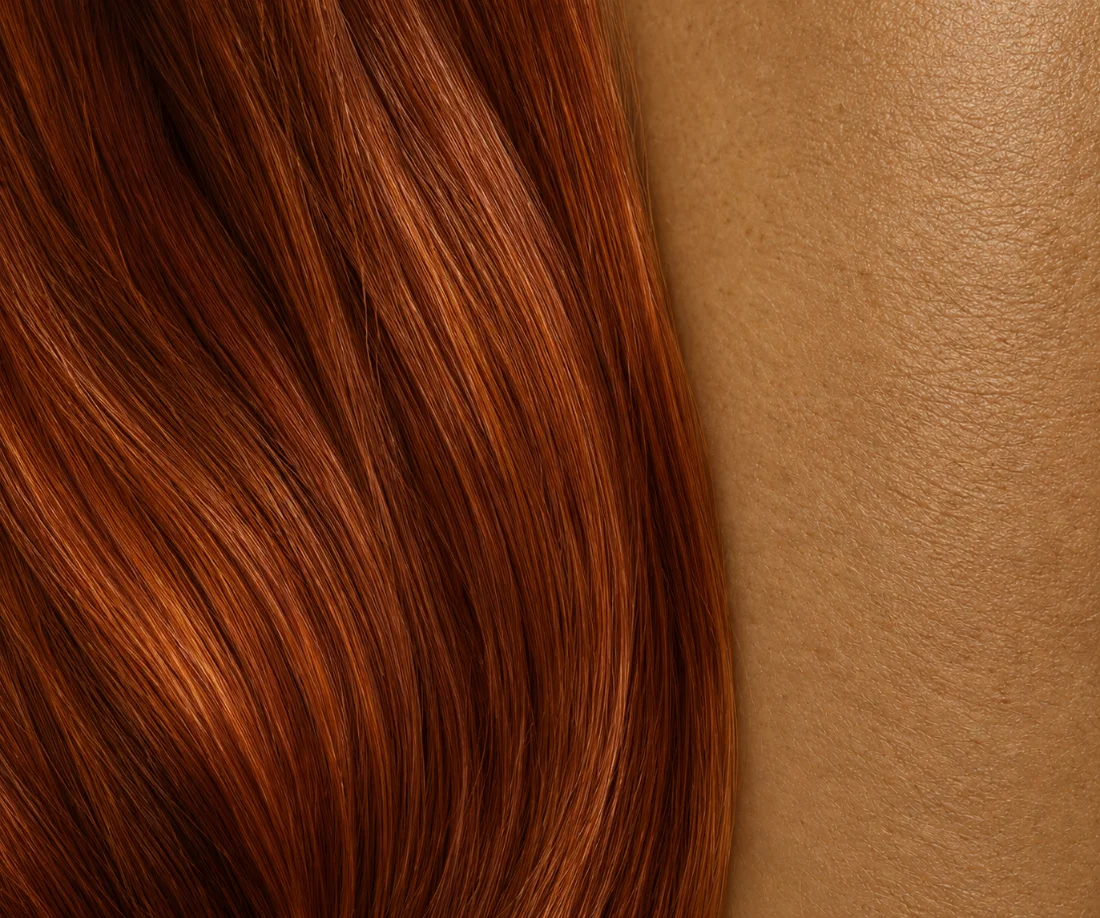 Deep copper red hair color next to olive skin — hair color for olive undertones, Poza Salon Charlotte